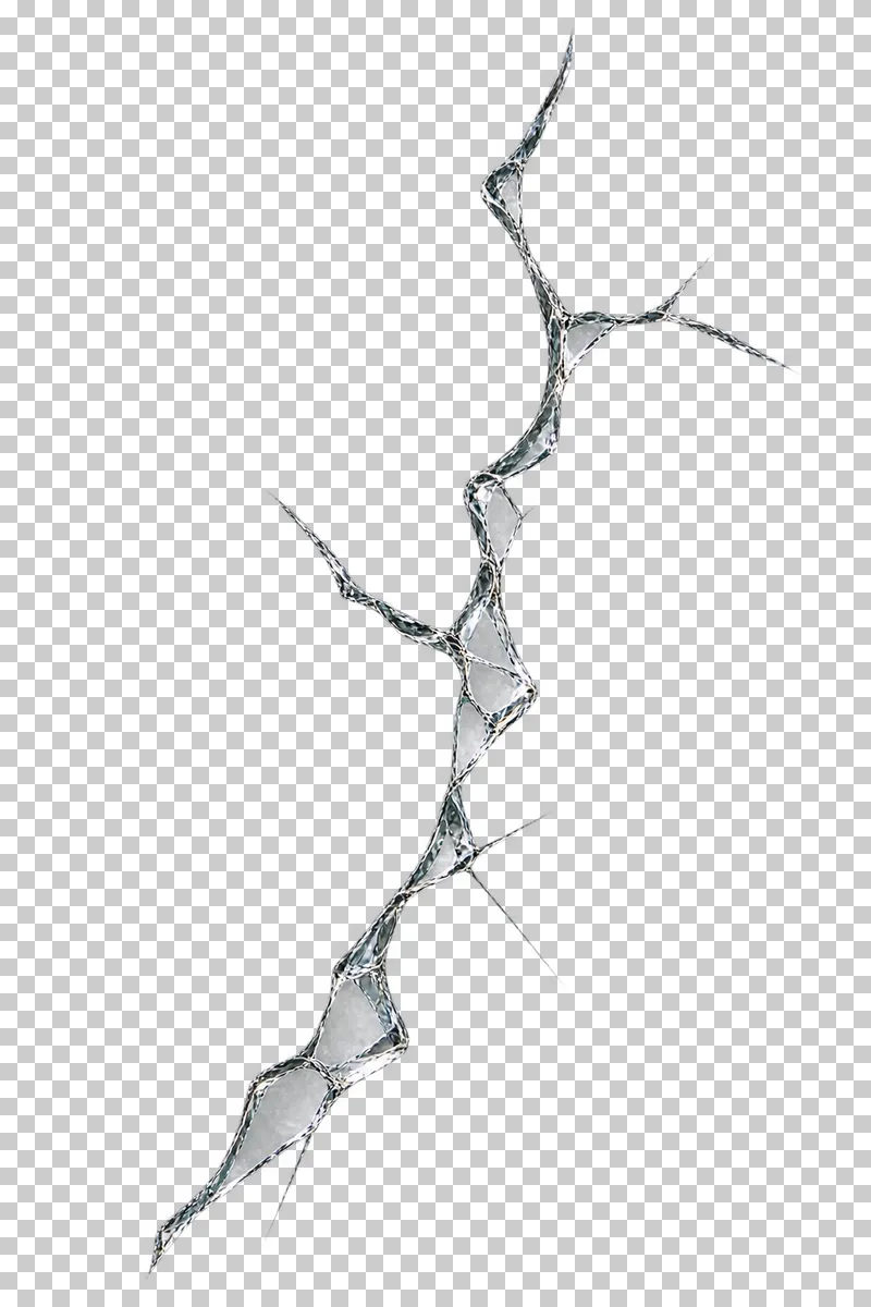 Clear broken glass: one long irregular fracture with finer branching cracks and little surrounding damage.
