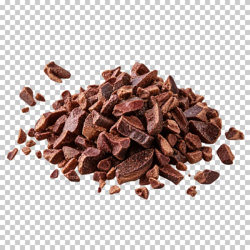 A small mound of irregular dry reddish-brown cacao nibs and loose kernel fragments.