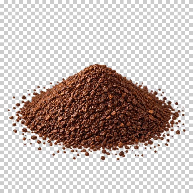 A mound of dry medium-ground coffee with scattered particles.