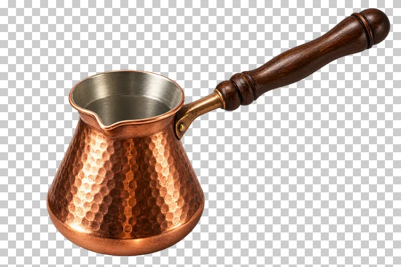 A copper cezve with a long wooden handle and visible lined interior.