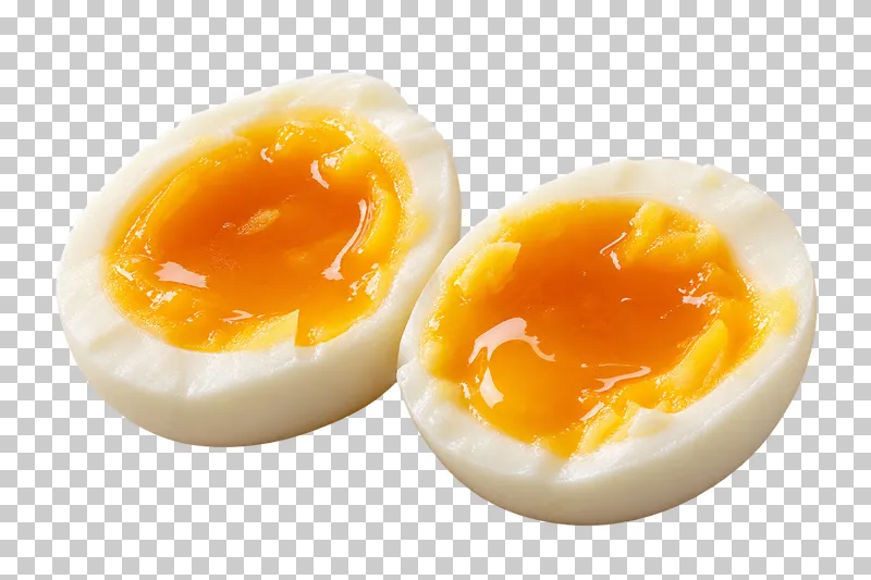 Two peeled soft-boiled egg halves with glossy orange yolks.