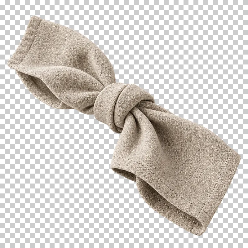 An oatmeal linen napkin tied in a relaxed central knot with two draped ends.