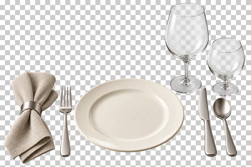 A formal dinner setting with an ivory plate, three utensils, wine glass, water goblet and linen napkin in a ring.