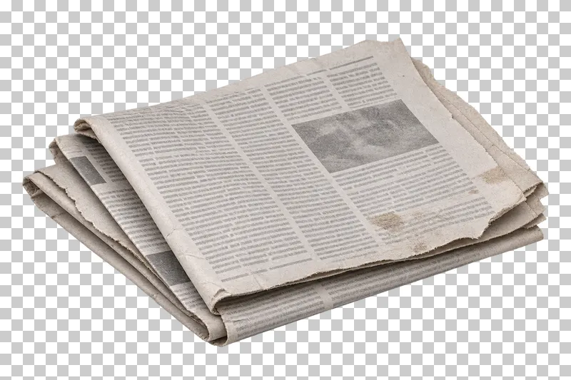 Torn folded newspaper bundle.