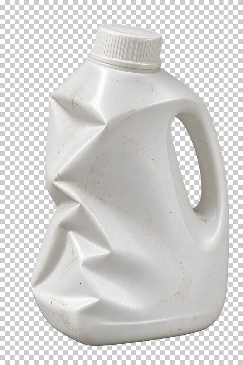 Dented empty detergent jug.