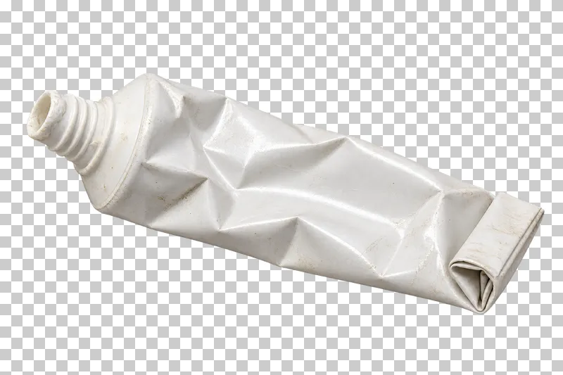 Squeezed empty toothpaste tube.