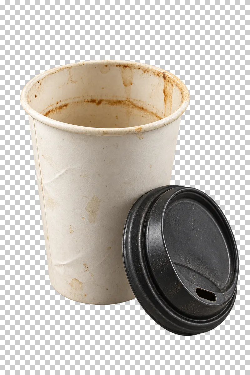 Stained takeaway paper cup with detached plastic lid.