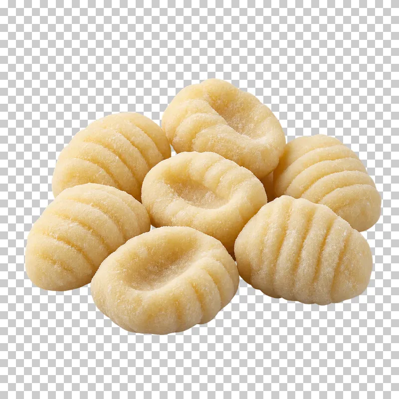 A compact group of uncooked potato gnocchi with ridged surfaces.