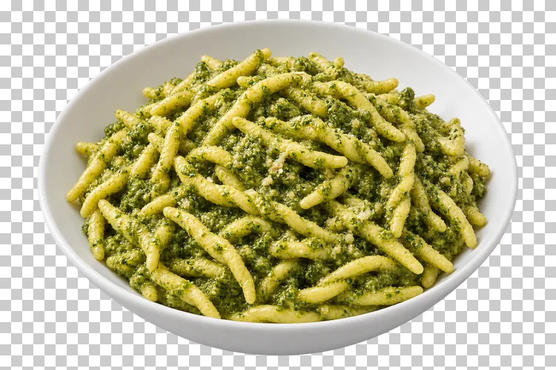 Trofie coated in green basil pesto in a white ceramic bowl.