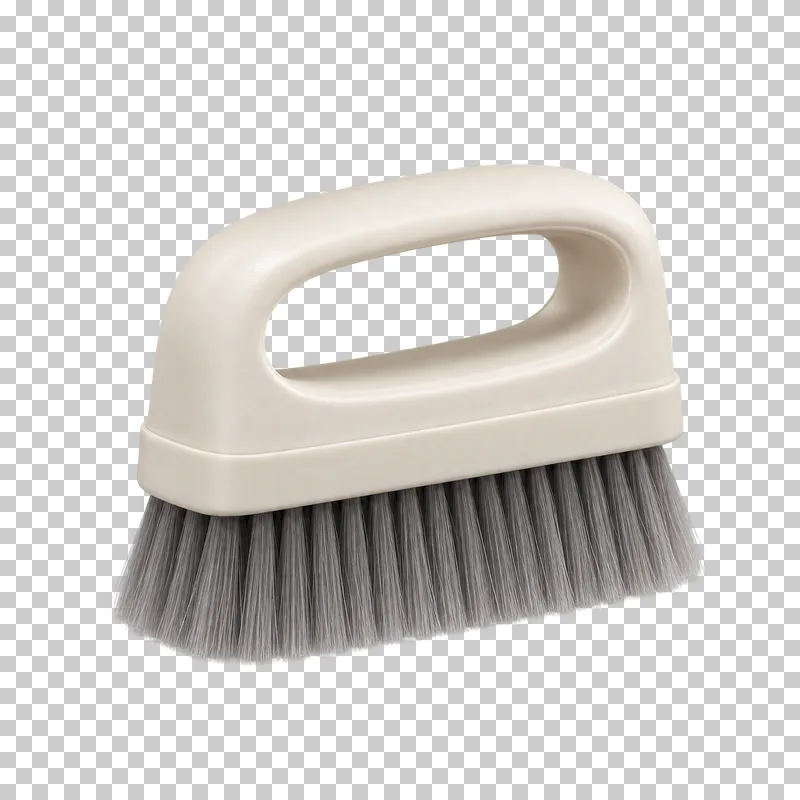 A compact ivory manicure dust brush with gray bristles and an open handle.