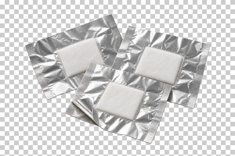 Three aluminum nail-removal wraps, each carrying a white cotton pad.