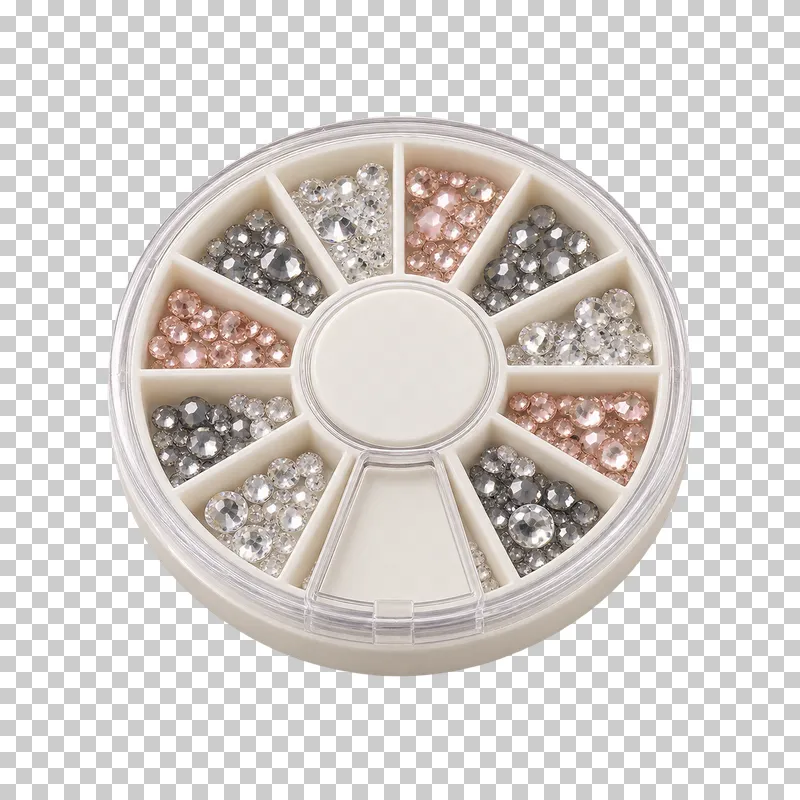 A round segmented nail-art rhinestone wheel filled with clear, gray, and rose crystals.