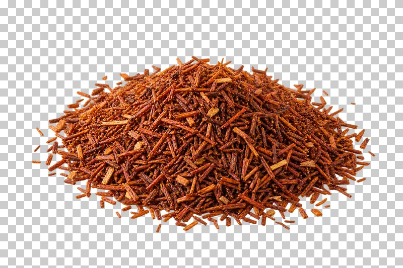 A pile of fine red-brown rooibos infusion fragments.