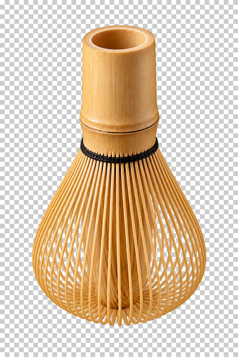 A complete bamboo chasen whisk with a hollow handle and curved tines.