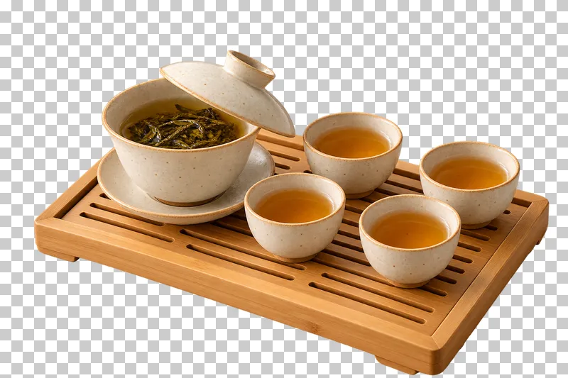 An ivory gaiwan and four small tea cups arranged on a bamboo drainage tray.