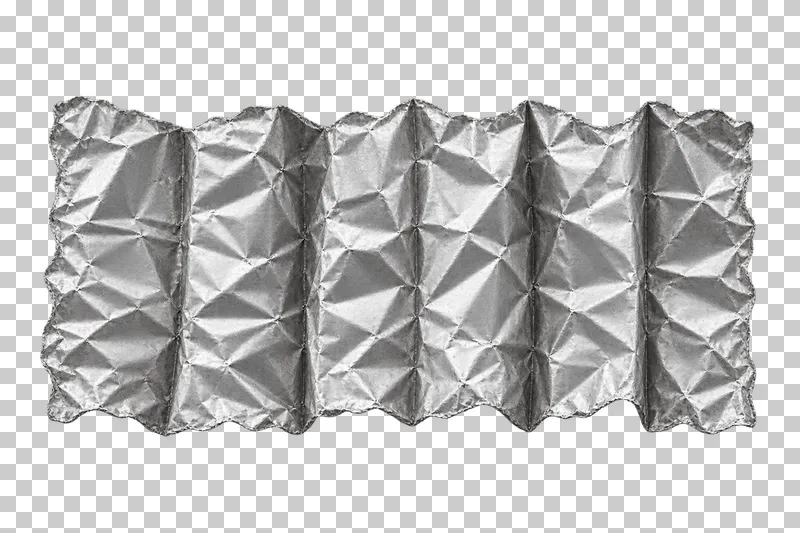 A silver foil strip folded into a horizontal accordion with broad pleats.