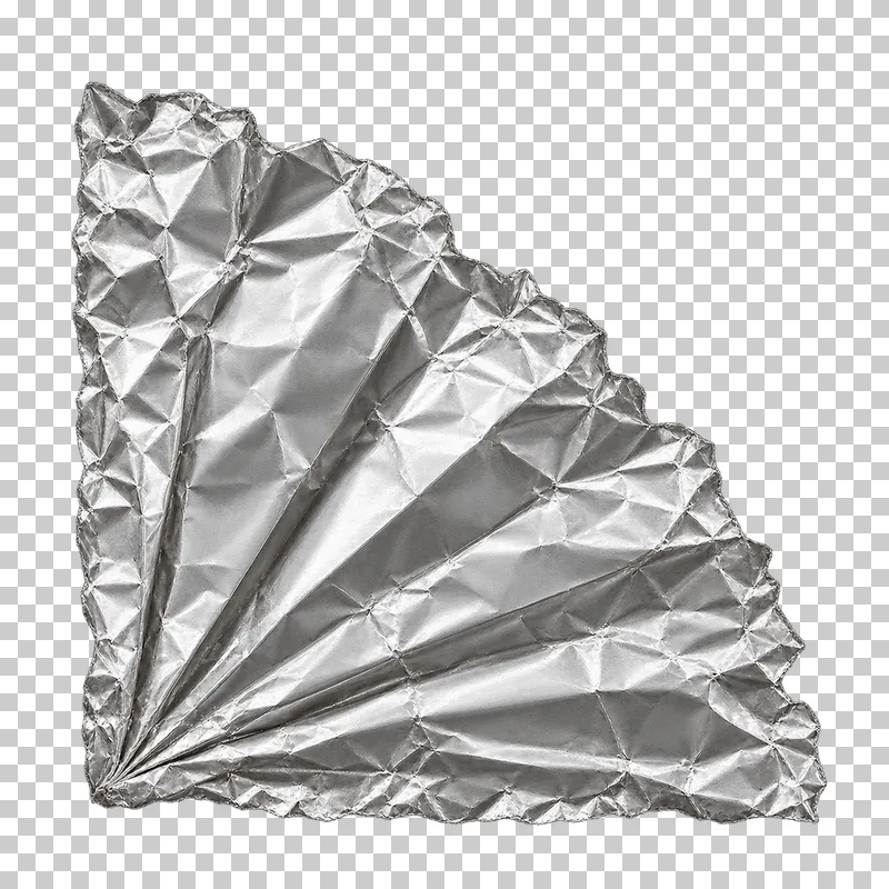 A quarter-circle silver foil corner with radial fan folds.