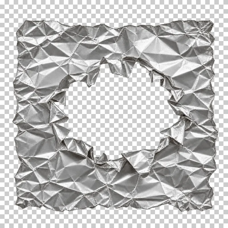 An irregular silver foil sheet with a torn oval opening and folded rim.