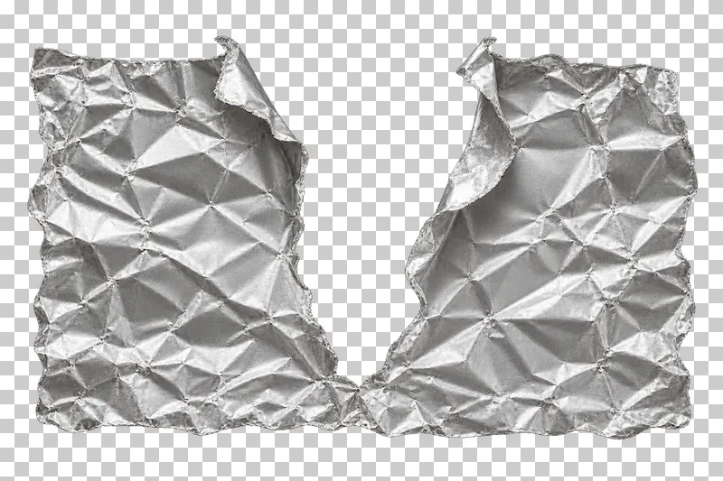 A silver foil sheet split down the center with two lifted torn flaps.