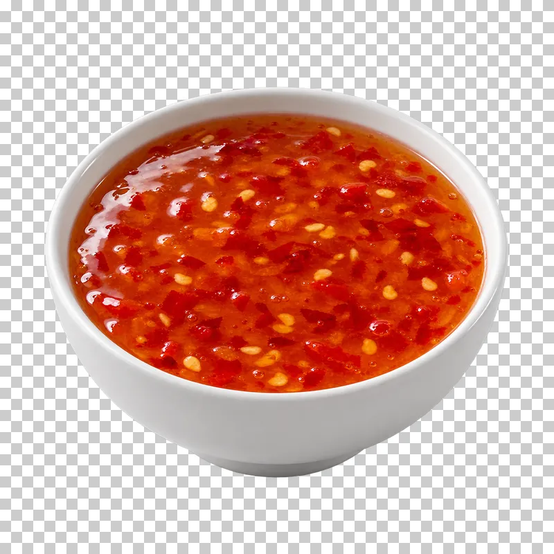A plain white ceramic bowl filled with sweet chili sauce.