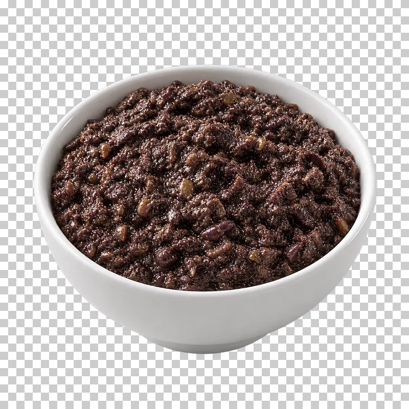A plain white ceramic bowl filled with black olive tapenade.