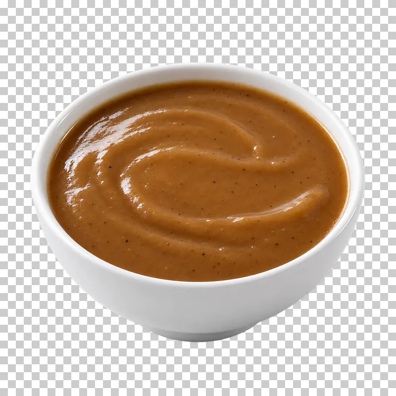 A plain white ceramic bowl filled with brown gravy.