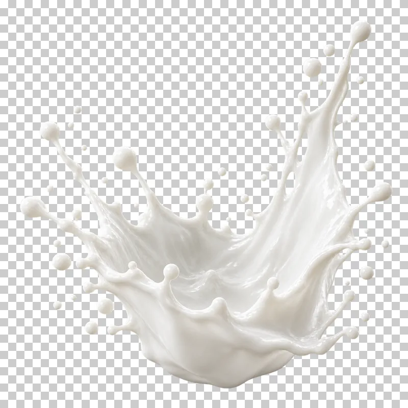 A tall asymmetric white milk crown with a raised wall and thin splash tips.