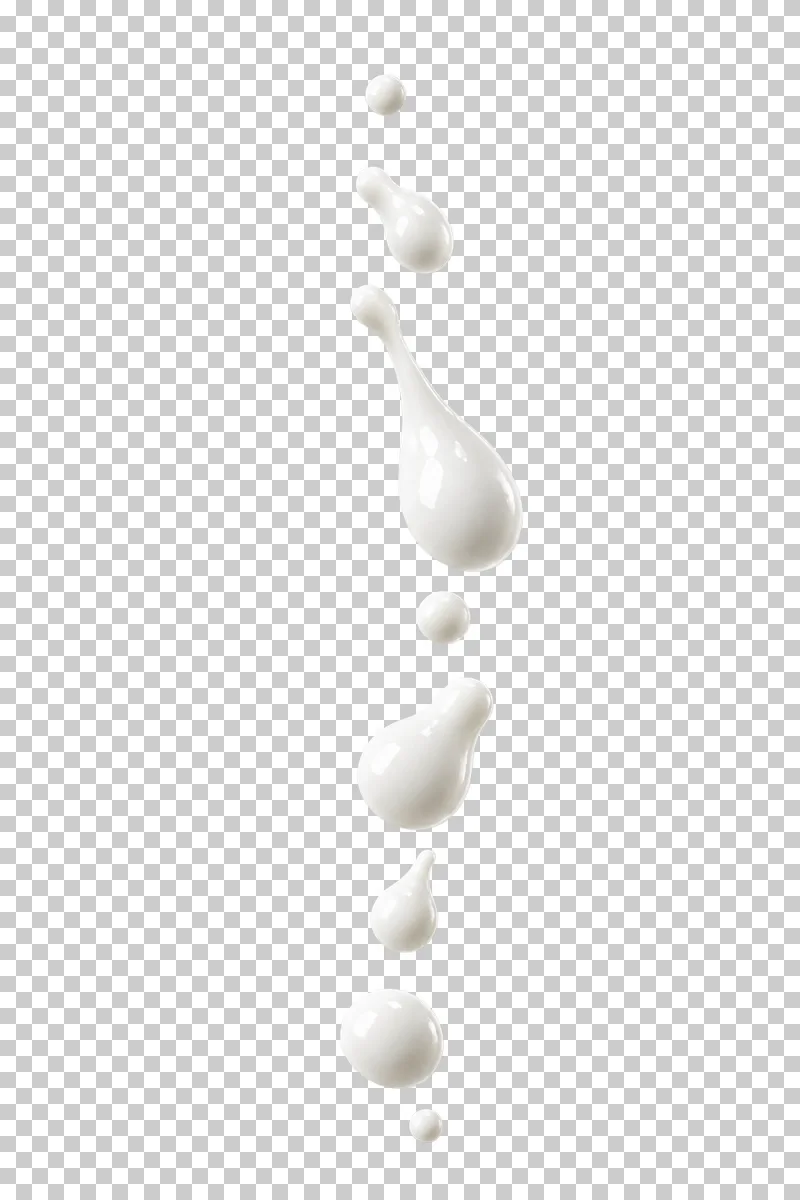 A vertical chain of separate falling milk droplets.