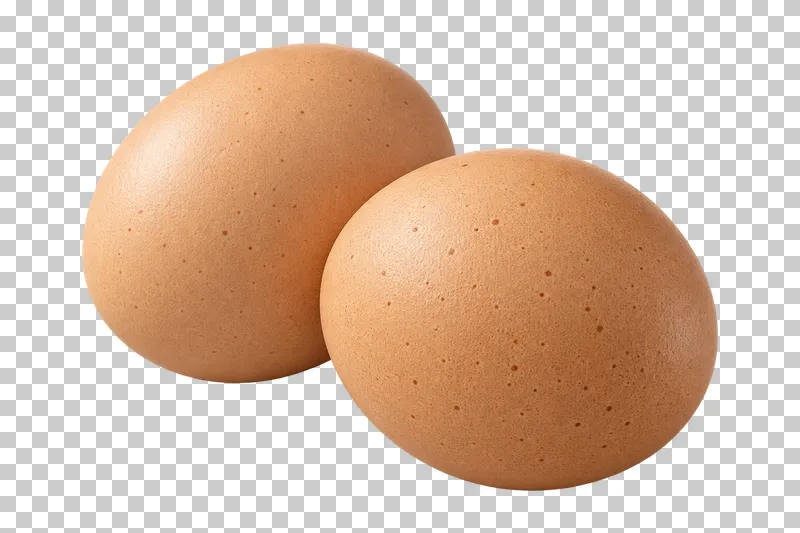 Two intact light-brown raw hen eggs.