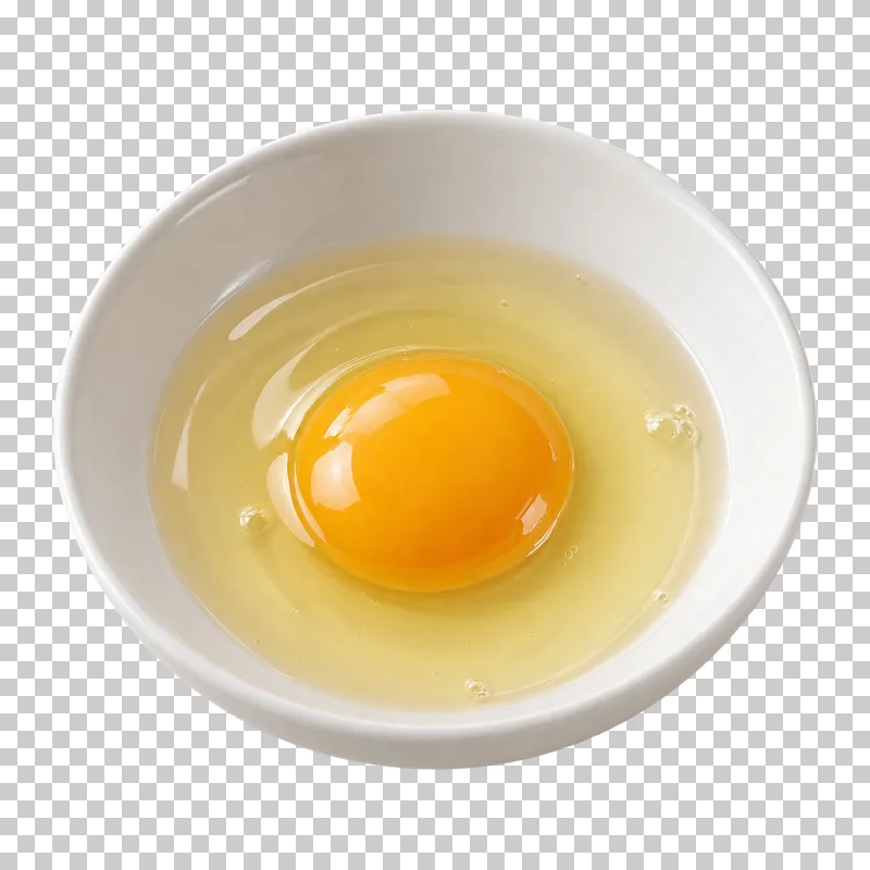 An intact raw yolk in clear egg white inside a white bowl.