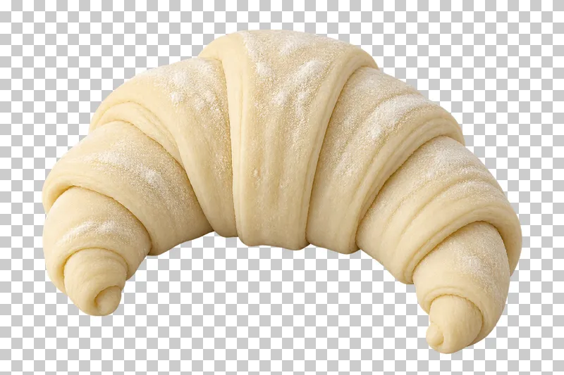 A pale raw shaped croissant with soft rolled dough layers.