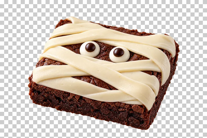 A rectangular chocolate brownie wrapped in raised ivory chocolate bandages with two candy eyes.