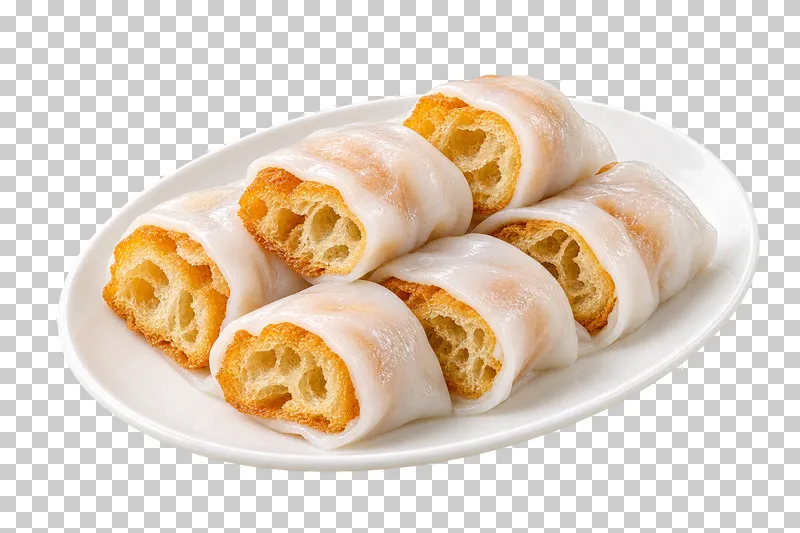 Six rice-noodle-wrapped cruller sections with airy golden cut ends on a white oval plate.