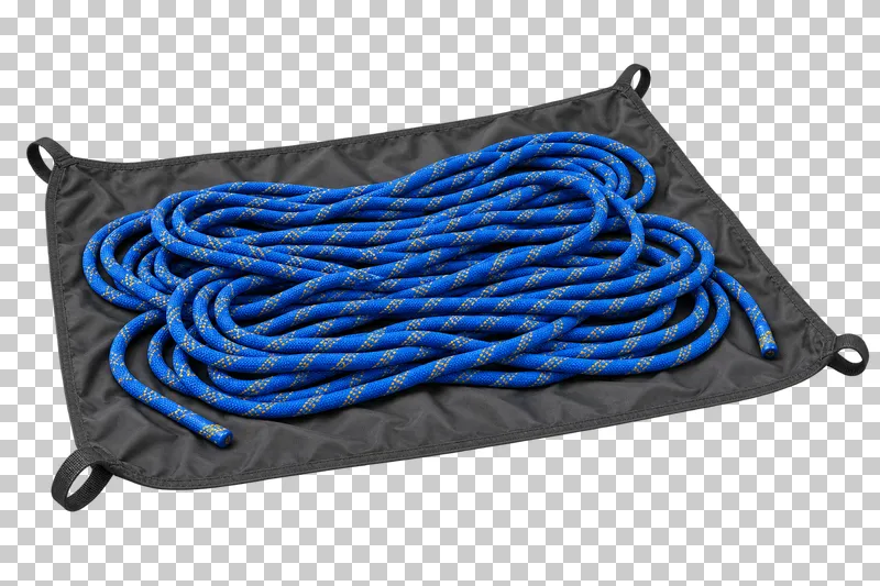 Loose flakes of cobalt patterned climbing rope with two visible ends on a complete graphite rope tarp.