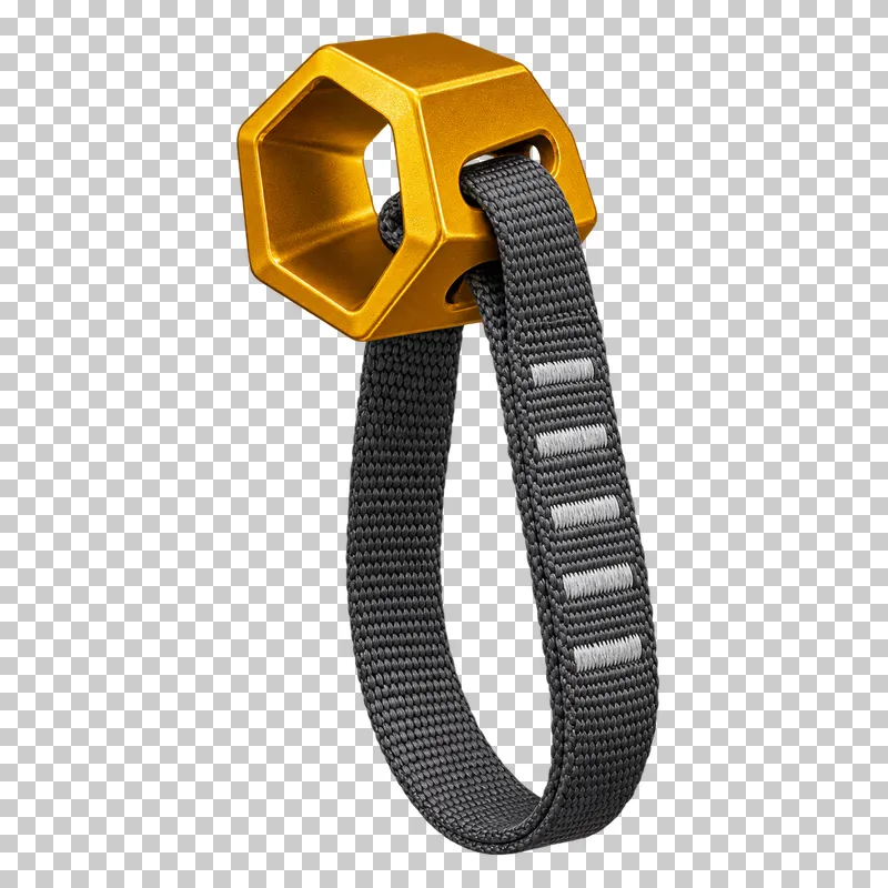A hollow mustard six-sided climbing hex chock with one connected graphite sewn sling.