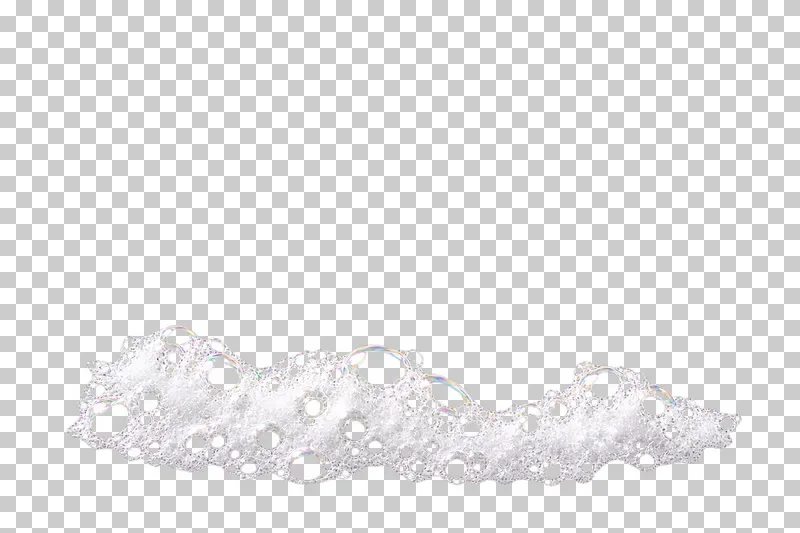 A shallow broad white foam bank with a scalloped upper edge and open cells.