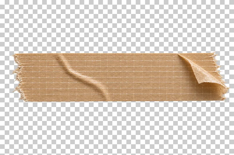 A brown kraft-paper tape strip with an embedded reinforcing grid and a lifted end.
