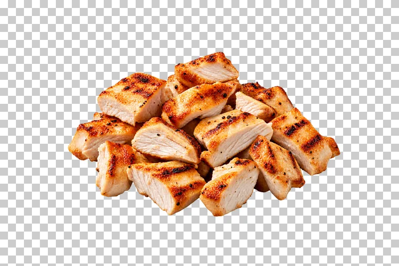 Compact portion of grilled chicken breast topping pieces with browned surfaces, subtle grill marks and visible meat fibers.