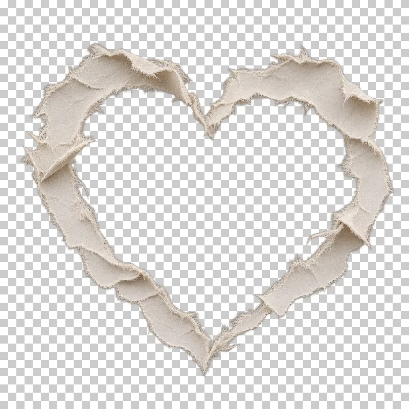 A hand-torn heart-shaped paper frame with rough fibers and several curled edges.