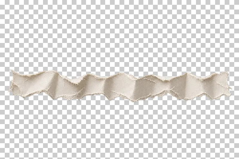 A long torn paper border folded into alternating uneven accordion ridges.