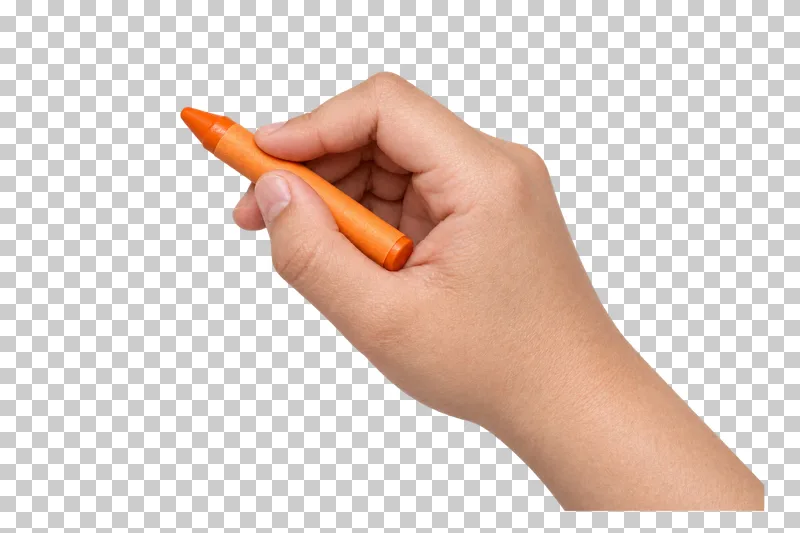 A light hand holds a short orange wax crayon with a paper wrapper.