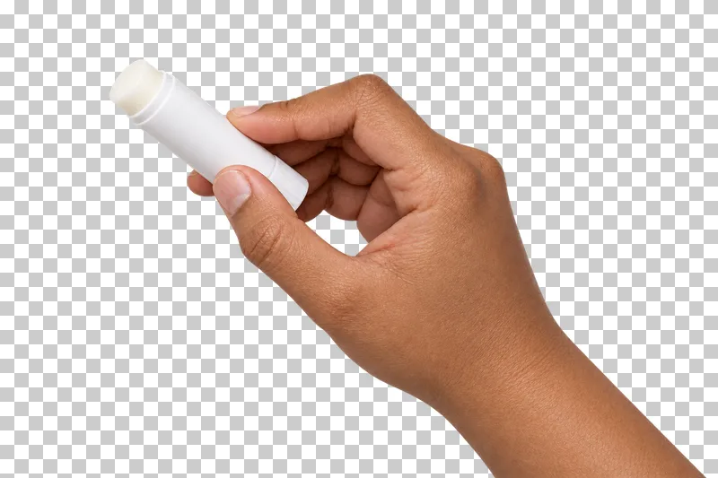 A medium-brown hand holds an uncapped glue stick with exposed white solid glue.