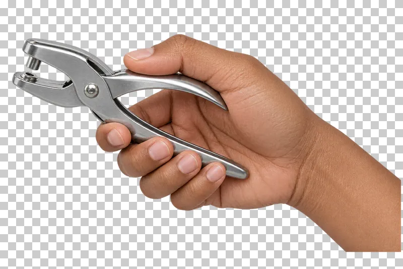A medium-brown hand squeezes a silver plier-style single-hole punch.