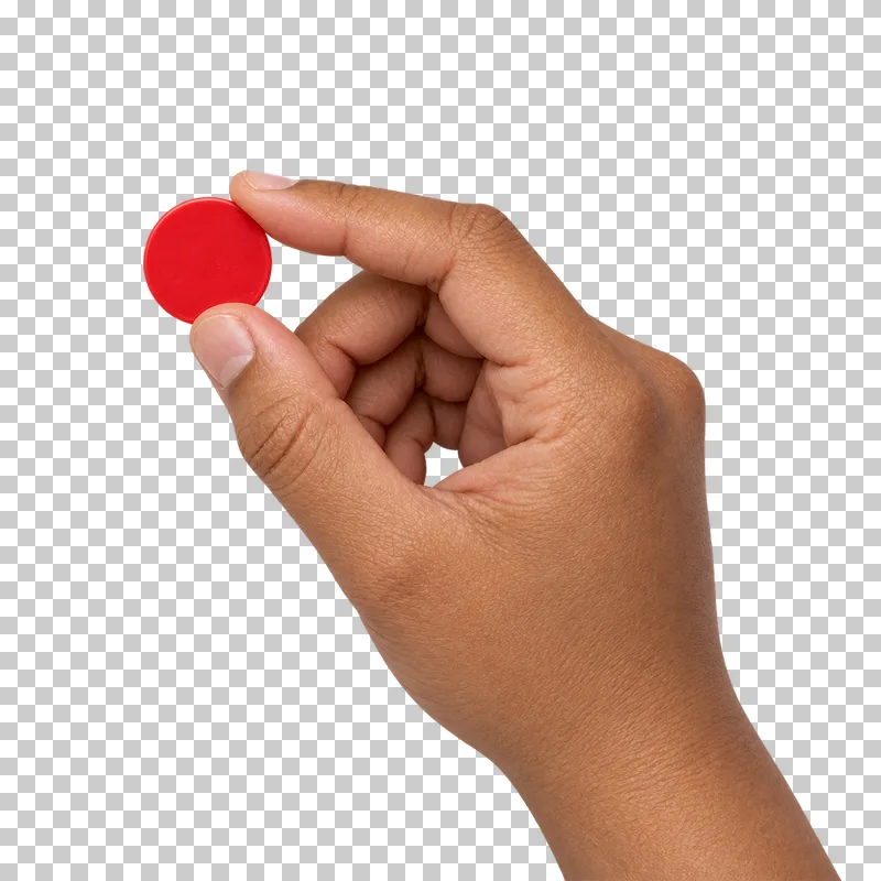 A medium-brown hand places a thin red circular counting counter.