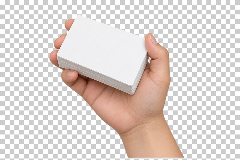 A light hand supports an aligned deck of blank white task cards.