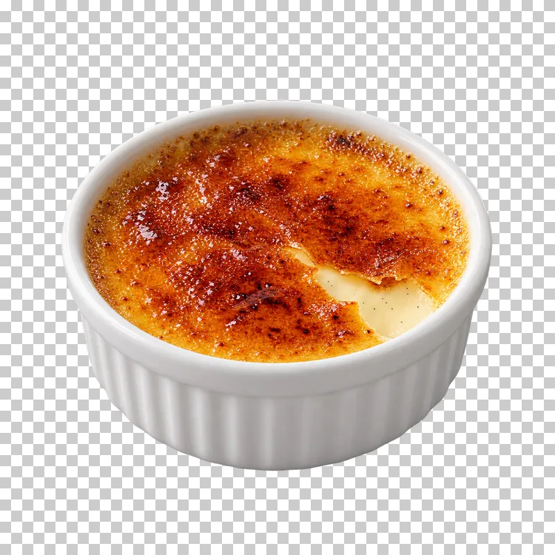 Creme brulee in a white ramekin with a cracked caramelized sugar top showing pale custard