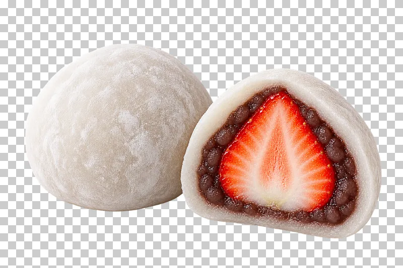 One whole white daifuku beside a cut half with a fresh strawberry enclosed in red-bean paste