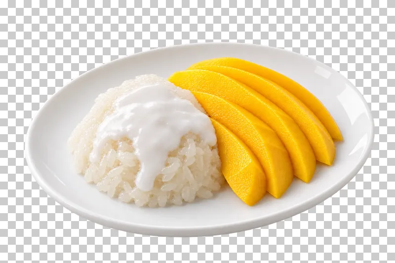 Mango slices beside coconut sticky rice and coconut cream on a white oval plate