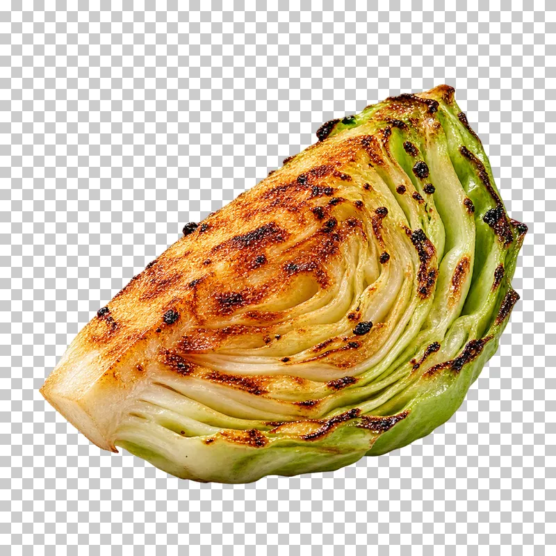 A thick pale-green cabbage wedge with nested leaves and a caramelized cut face.