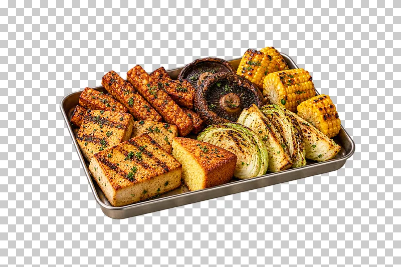 A metal sharing tray with grilled tofu, tempeh, portobello mushrooms, corn, cabbage and cornbread.